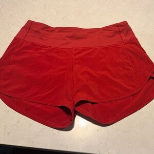 lululemon vibrant red run shorts